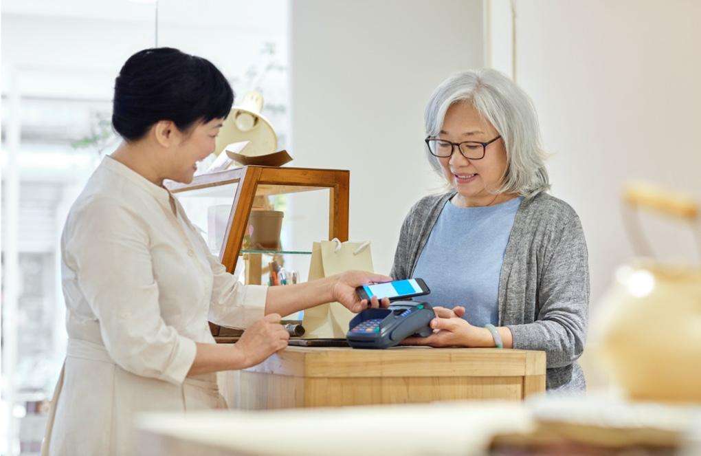 Customer paying with credit card Customer paying with credit card