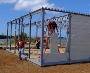 Employees volunteer at Kahauiki Village Employees volunteer at Kahauiki Village