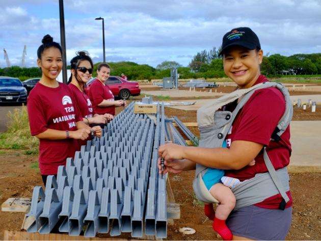 Employees volunteer at Kahauiki Village Employees volunteer at Kahauiki Village