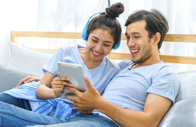 Couple looking at a tablet Couple looking at a tablet