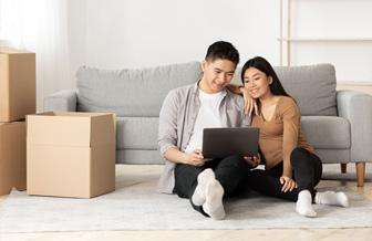 Couple looking at a laptop