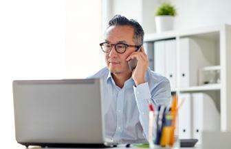 Man with Laptop at Work