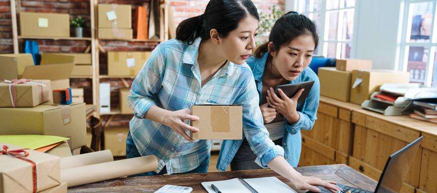 Women looking at documents